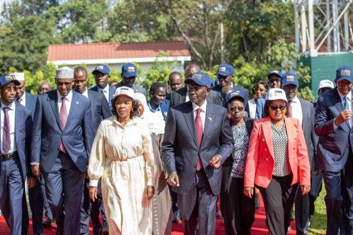 Leaders in EWENE caps walking together at the launch