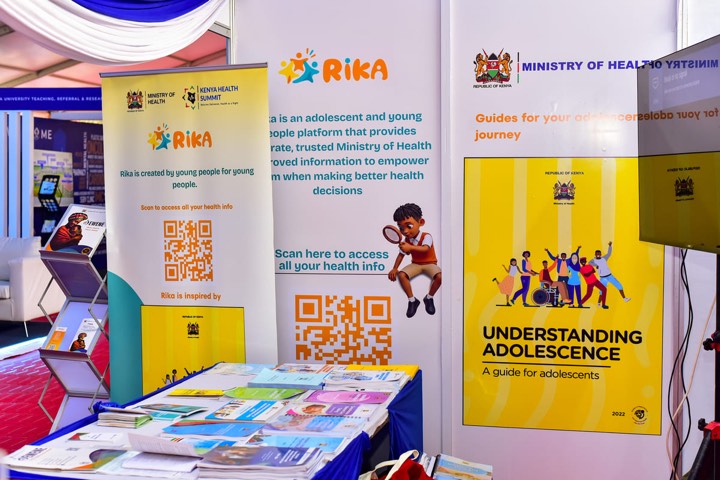 RIKA and Understanding Adolescence banners at the Ministry of Health stand